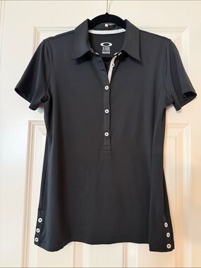 Oakley women’s  performance golf shirt - NWOT size M